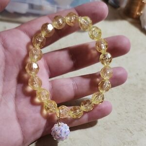 Elegant Yellow Beaded Bracelet with Charm
